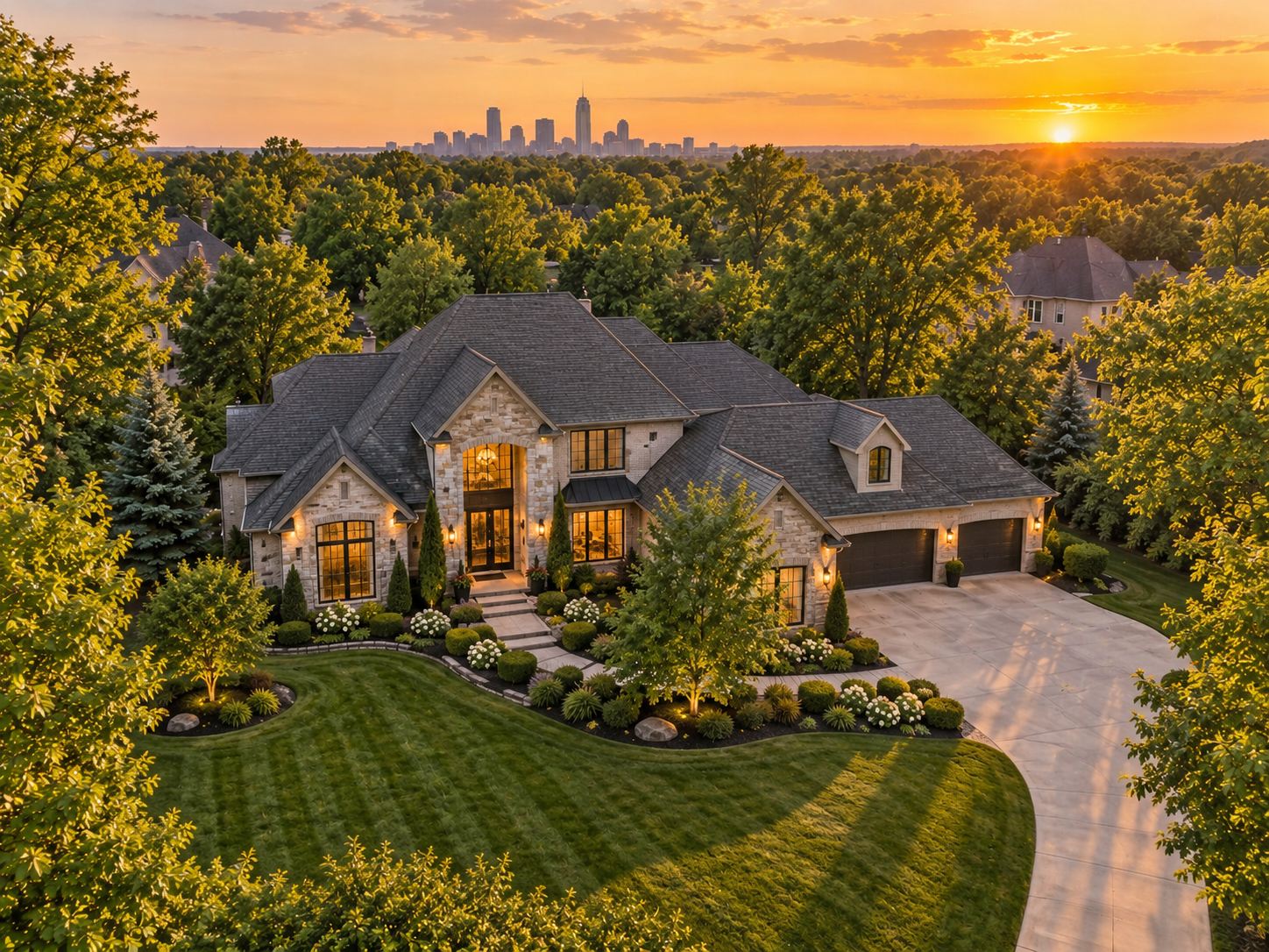 Luxury estate and its surroundings photographed from above at golden hour